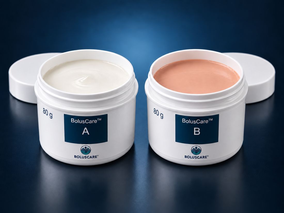 Two opened BolusCare 80g jars with component A (white) and component B (skin-toned)